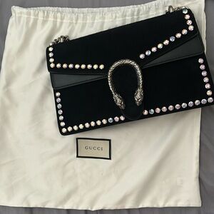 Black suede Gucci Dionysus with crystal embellishments